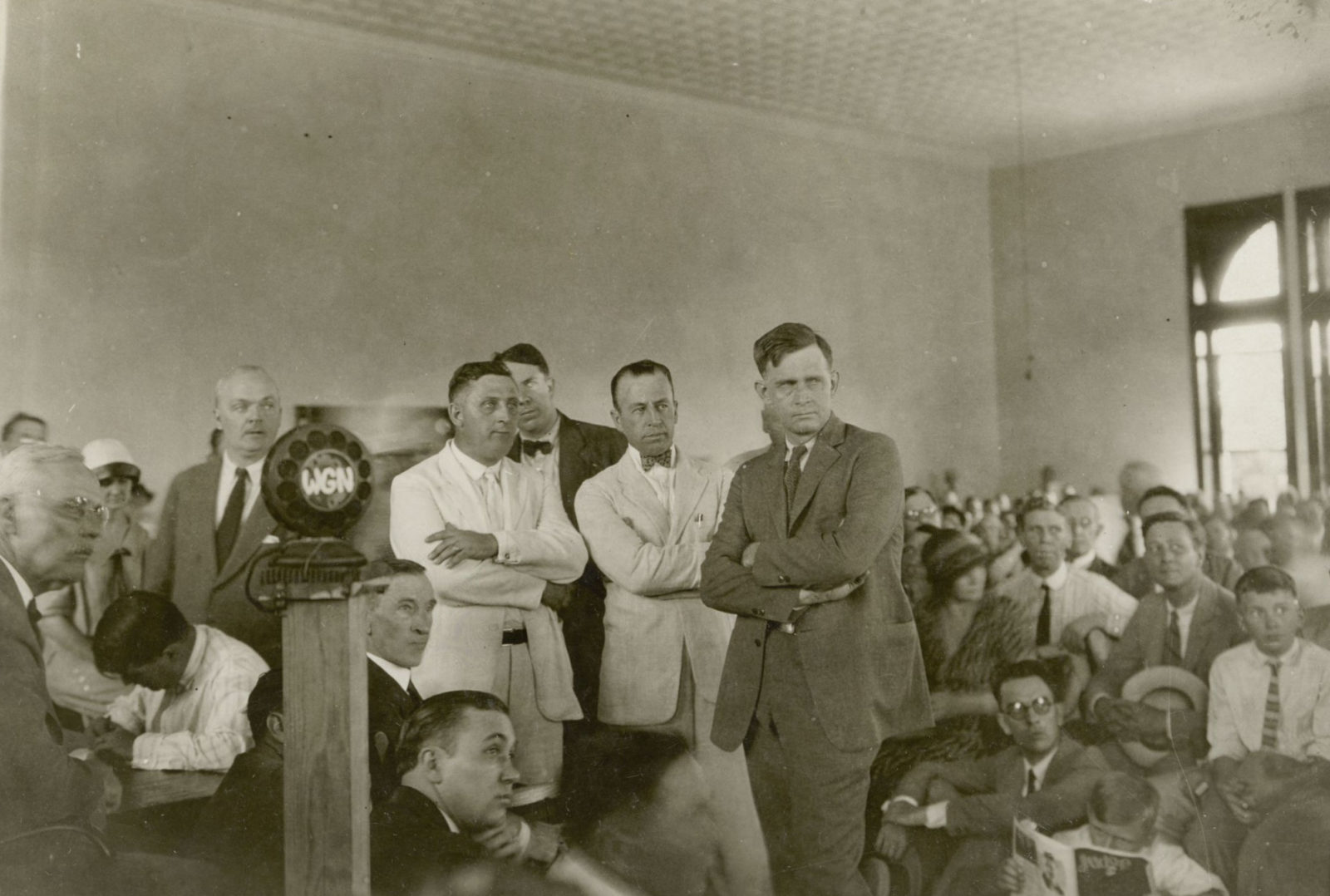 Several prosecutors standing, arms folded at Scopes Trial