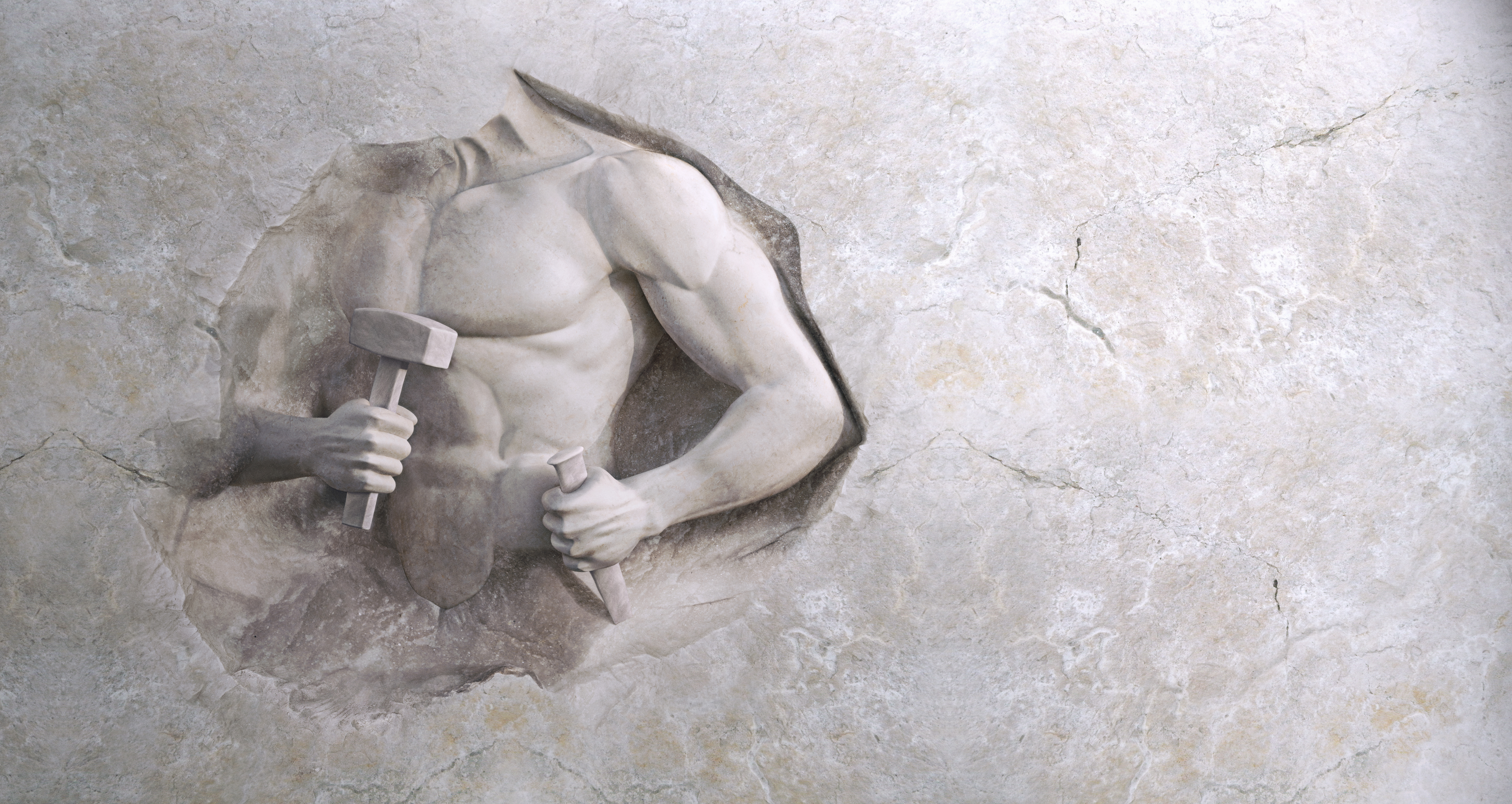 athletic man cuts his body of marble stone