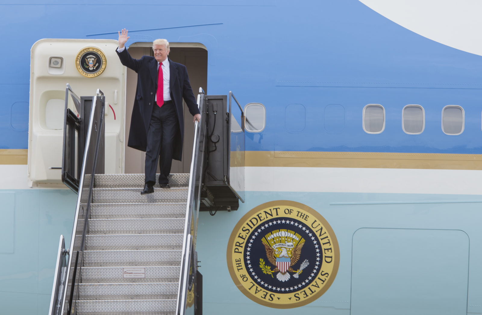 President Donald J. Trump waves to the crowd while exiting Air Force 1 at St. Louis Lambert International Airport Nov. 29, 2017. President Donald J. Trump exits Air Force One in St. Charles, MO.