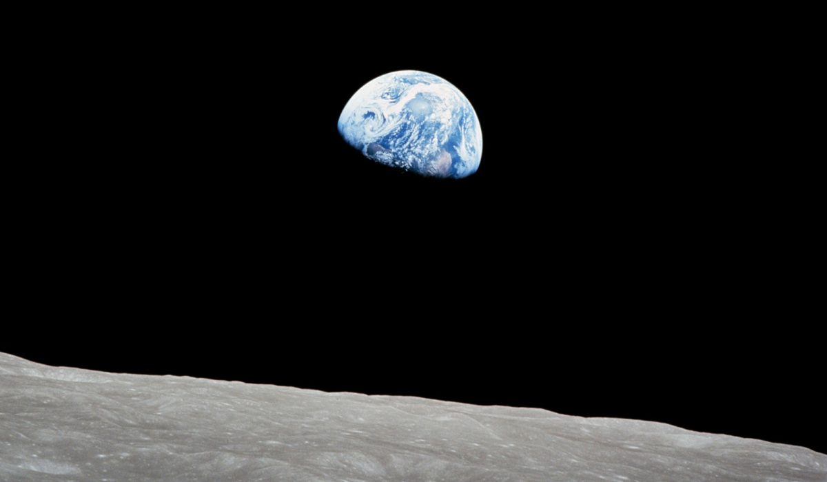 The Earth rises above the lunar horizon, photographed from Apollo 8, December 24, 1968. (NASA)