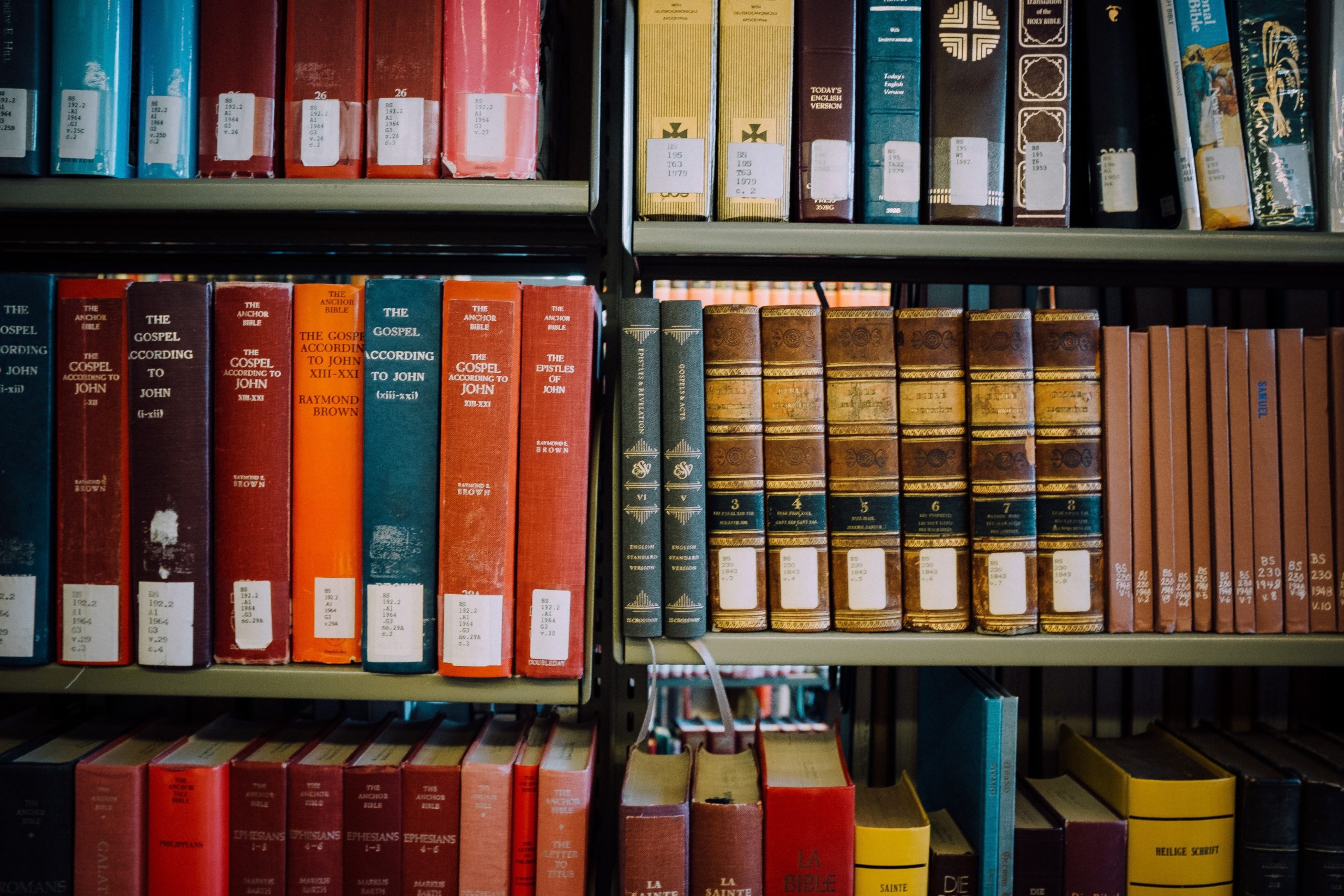 Crossway Reader's Bible and commentaries on shelves at the seminary library of Mt. Angel Abbey in Mt. Angel, OR.https://www.crossway.org/bibles/esv-readers-bible-six-volume-set-cob/