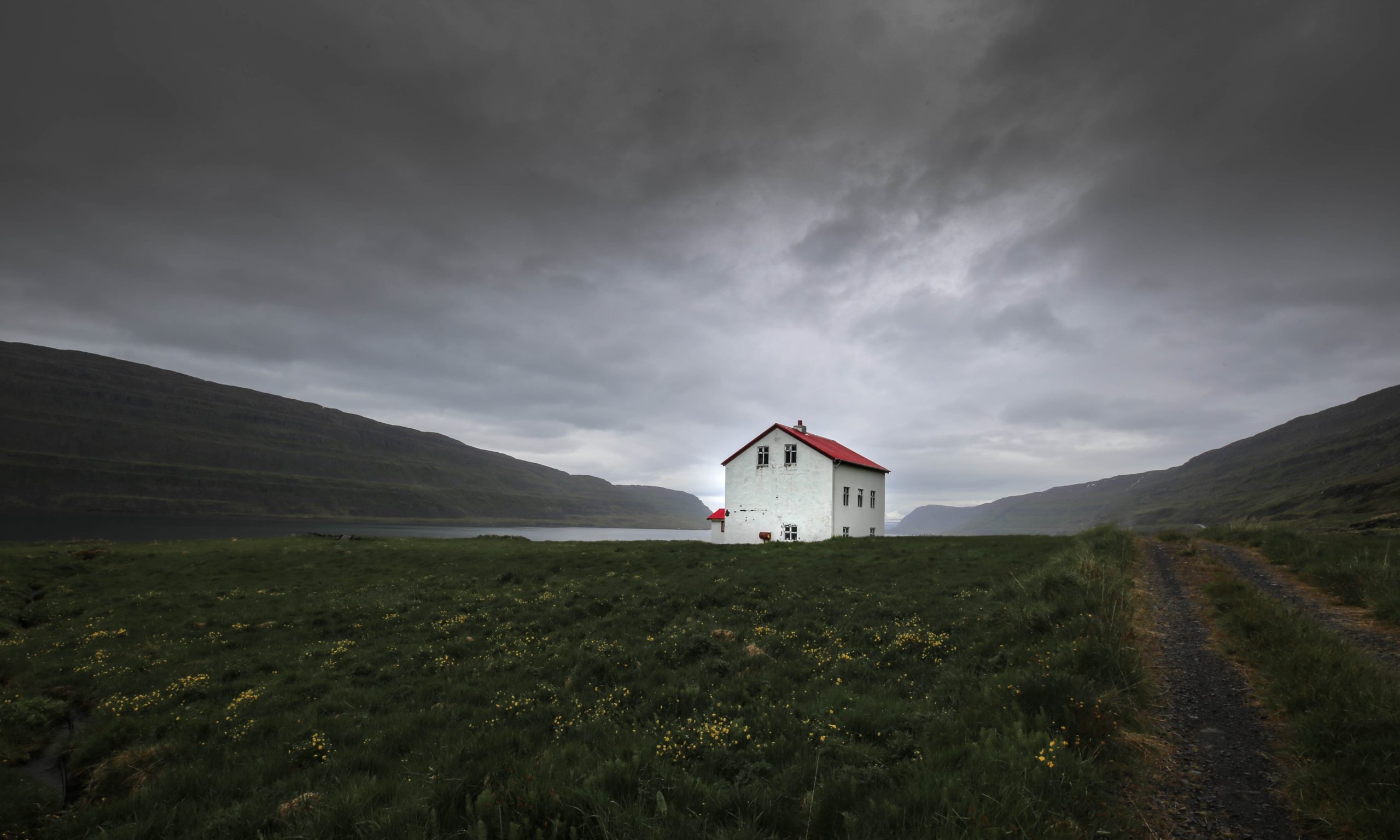 architectural photography of red and white house