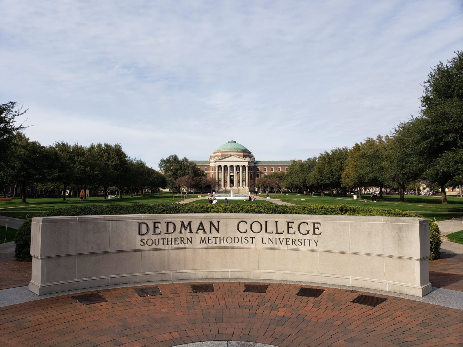 Dallas Hall and the Dedman College monument at Southern Methodist University (SMU) in Dallas, TX