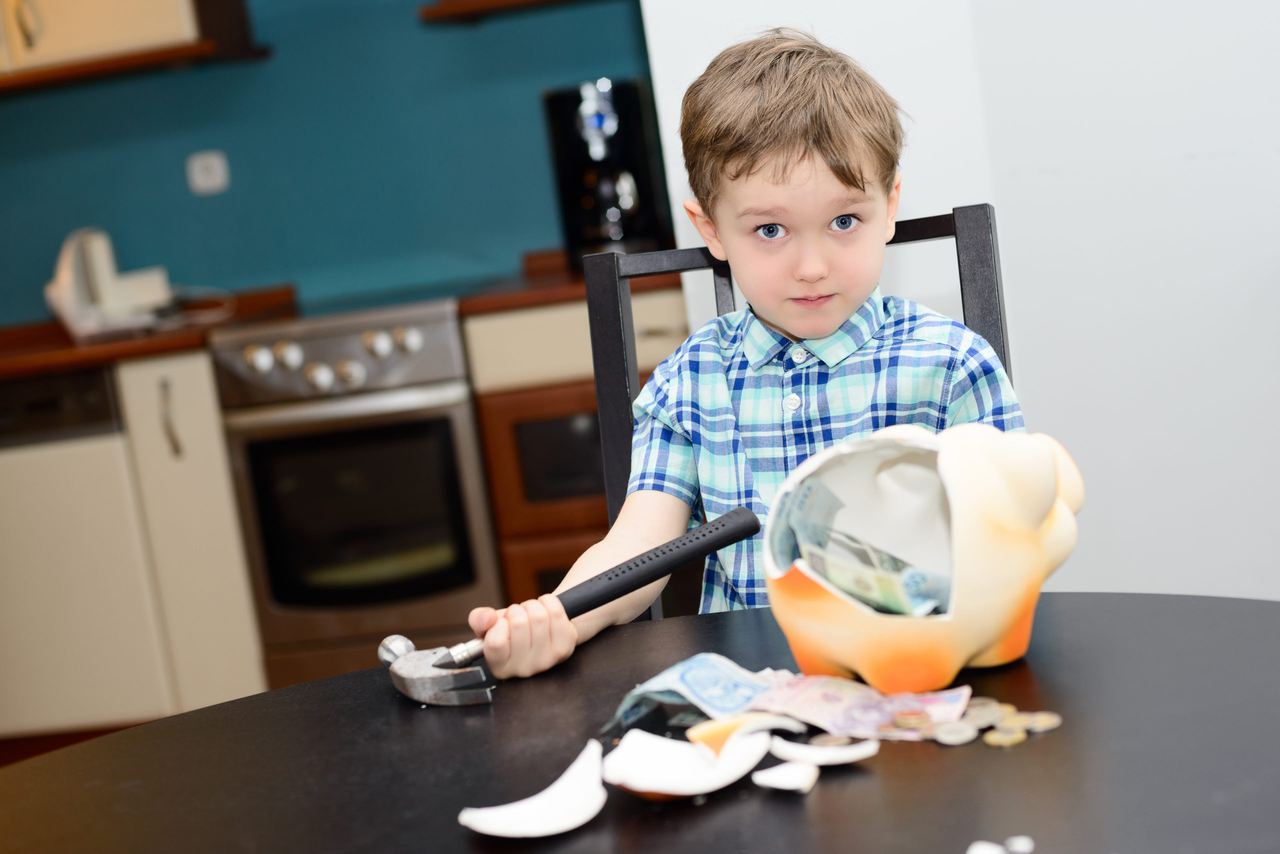 4 year old boy and smashed his piggybank at home