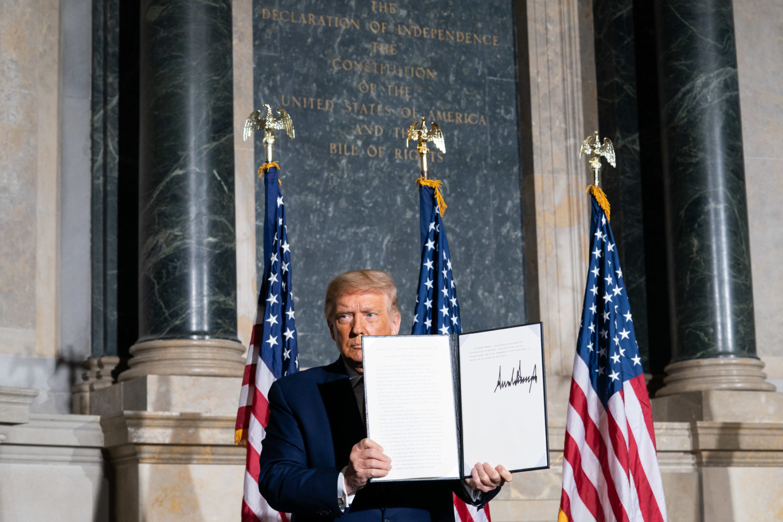 President Donald J. Trump signs the Constitution Day, Citizenship Day, and Constitution Week 2020 Proclamation Thursday, Sept. 17, 2020, during the White House Conference on American History at the National Archives and Records Administration in Washington, D.C
