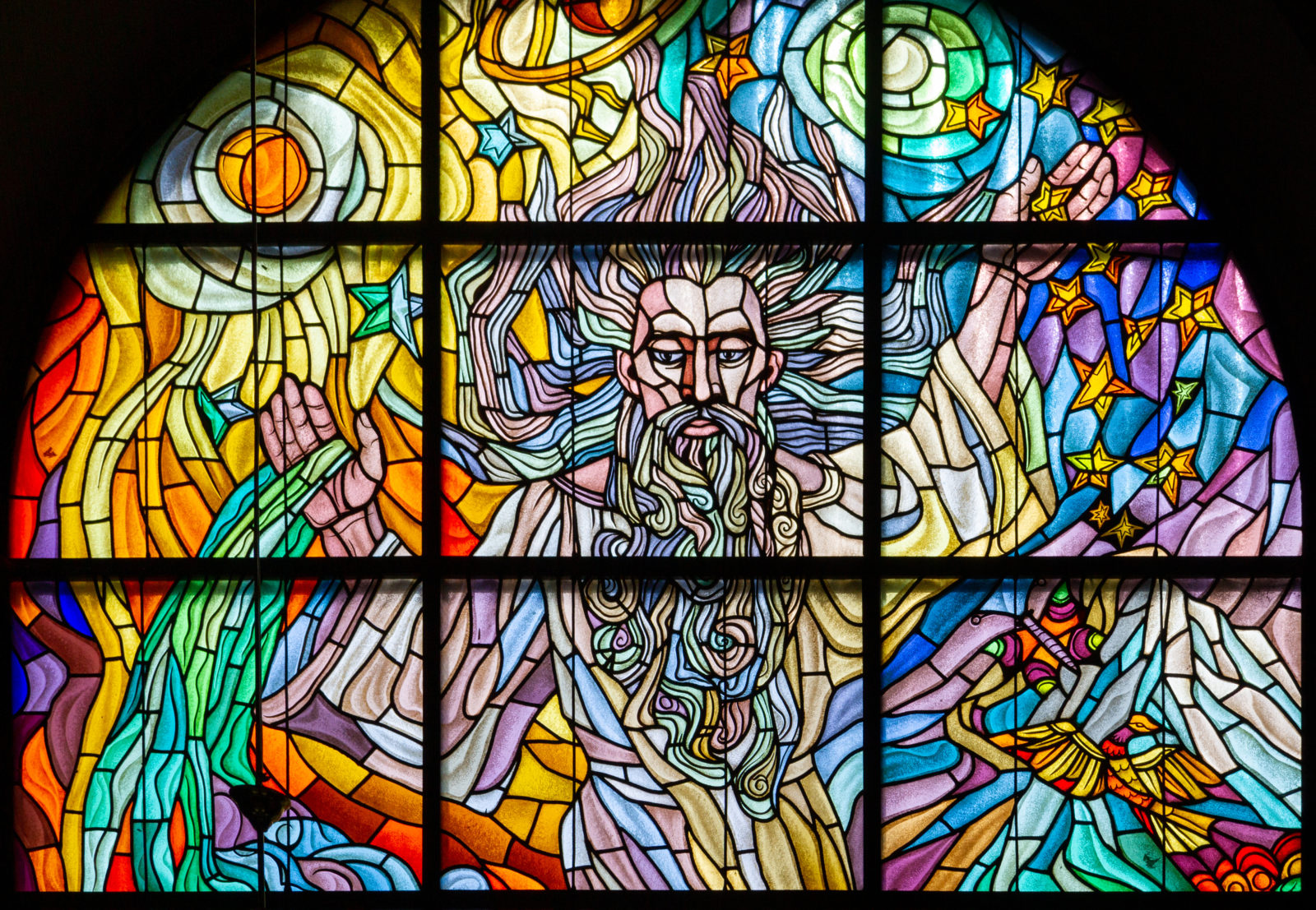 Zegiestow, Poland. 2019/8/10. Stained-glass window depicting the Creation of the World with the words 