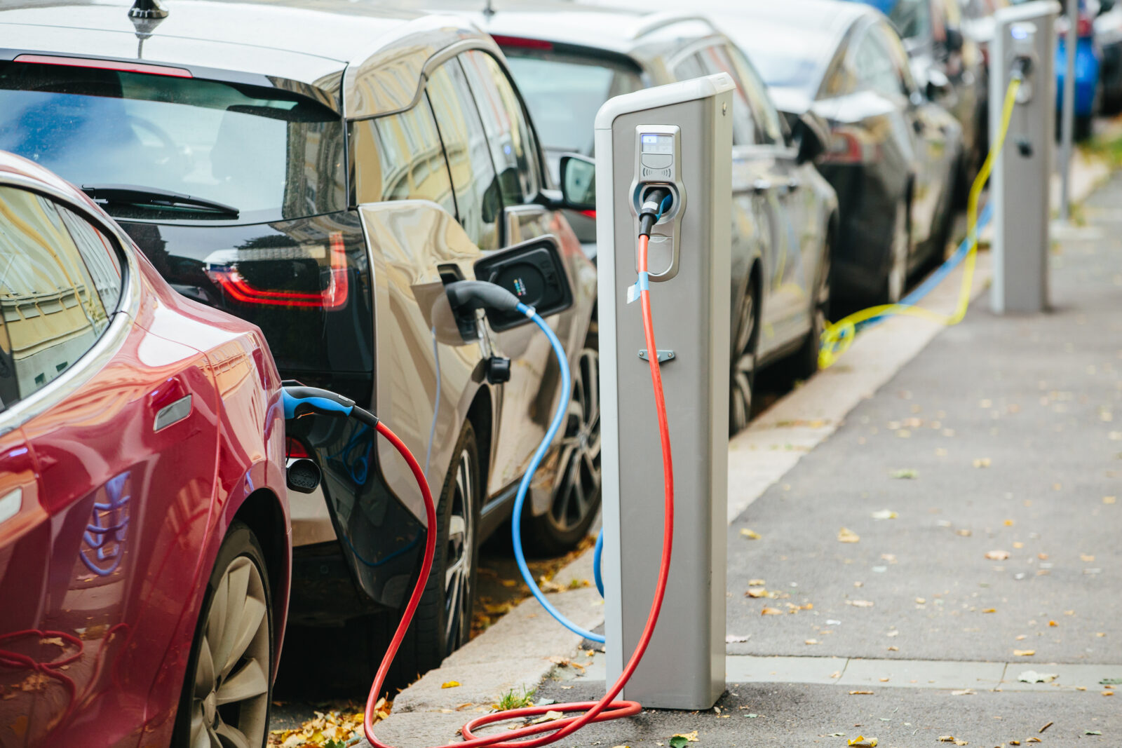 Vehicle with an electric motor. Electric vehicle charging. Eco car.