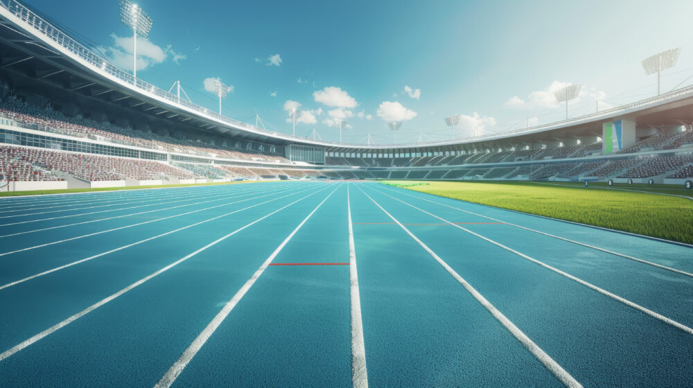 Blue racetrack on a sports field at olympic stadium