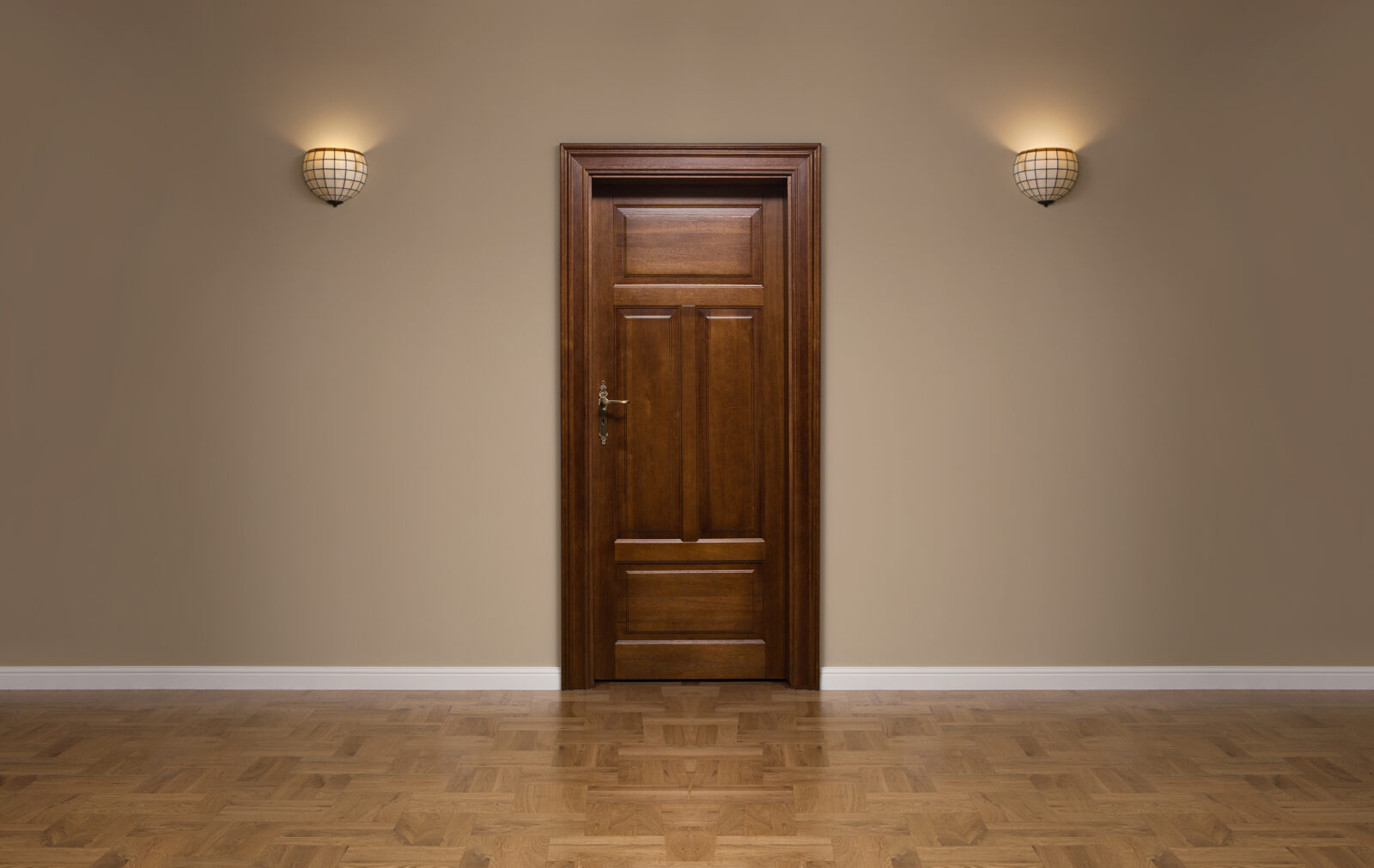 Closed wooden door in the empty room with copy space