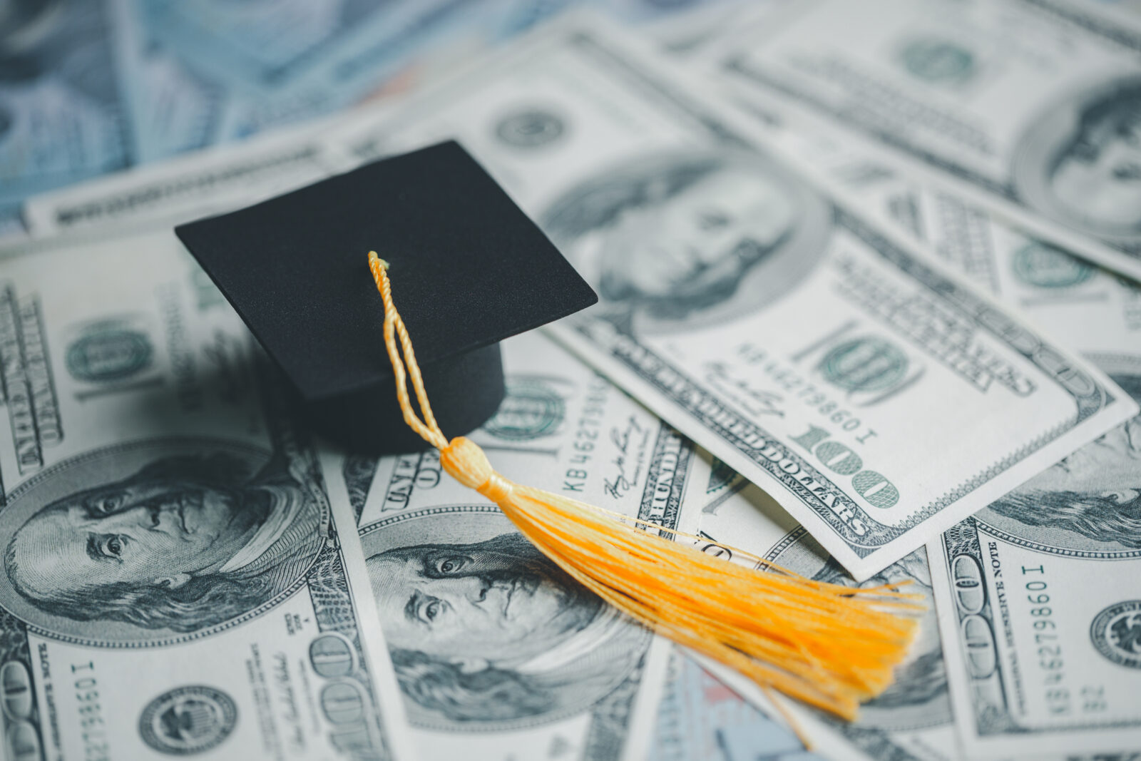 Saving money coin with banking investment, finance education concept. Planning student loan for studying abroad for college or university degree. Future children's education fund cash. Growing saving