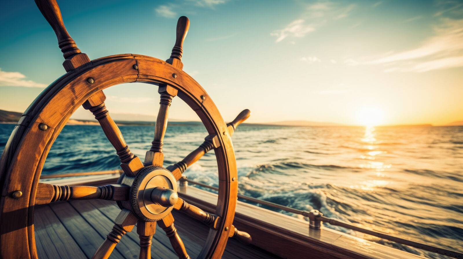 ship wheel on boat with sea and sky. freedom and adventure. direction concept