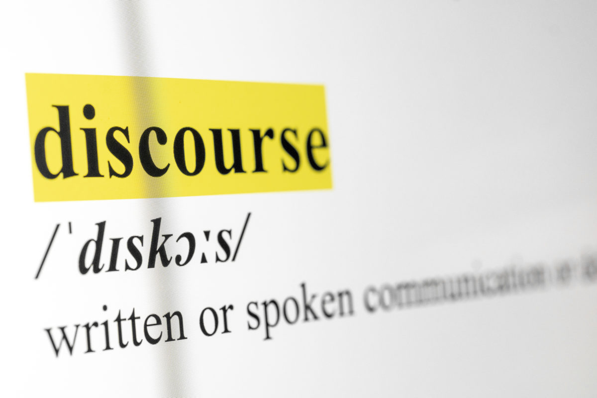 Discourse Text Macro Shot Highlighted in Yellow Color On Computer Screen
