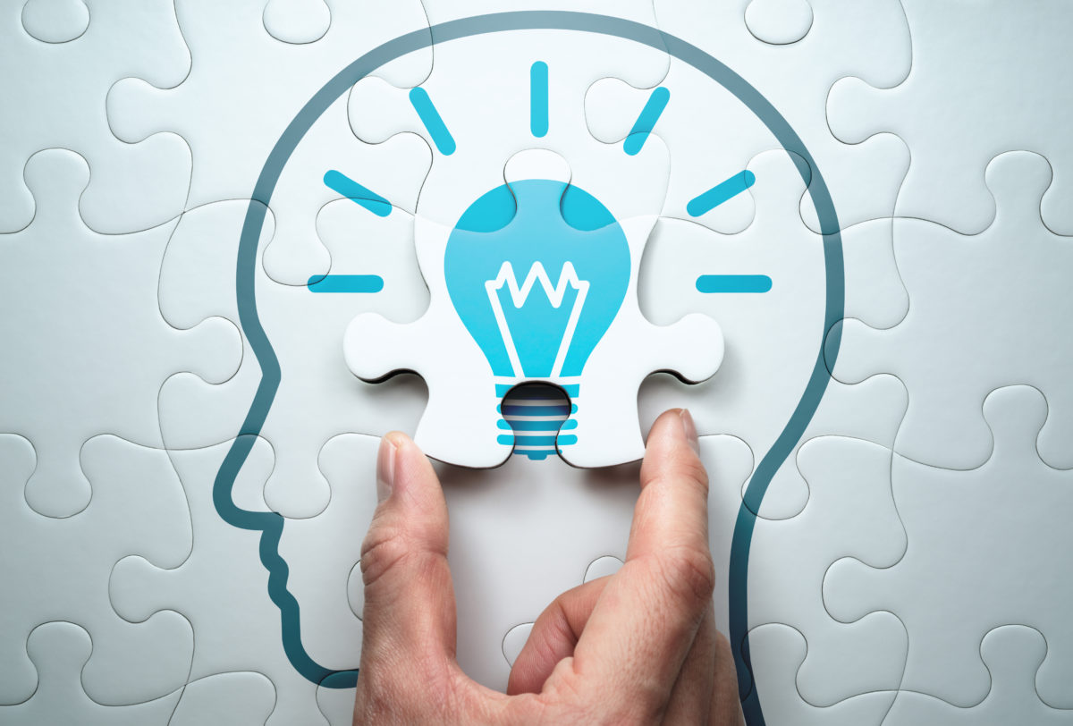 Getting knowledge and solving problem. Logical idea concept. Connecting last jigsaw puzzle piece.