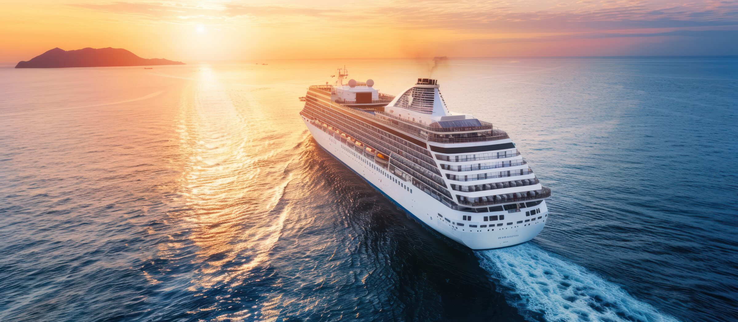 Account photo of a luxury cruise ship sailing in the open sea at sunset