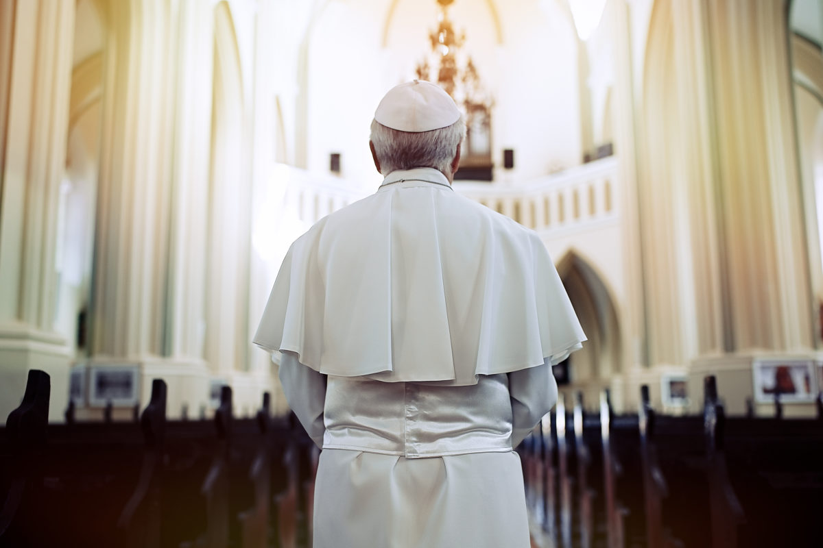 Pope in the church. Back view