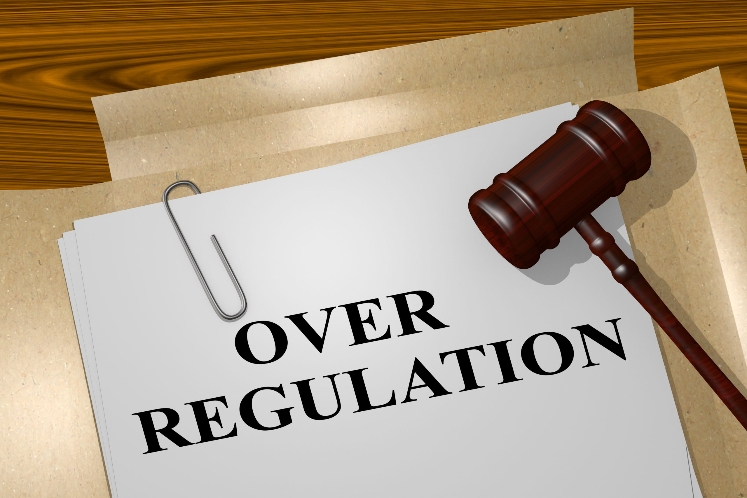 3D illustration of "OVER REGULATION" title on legal document