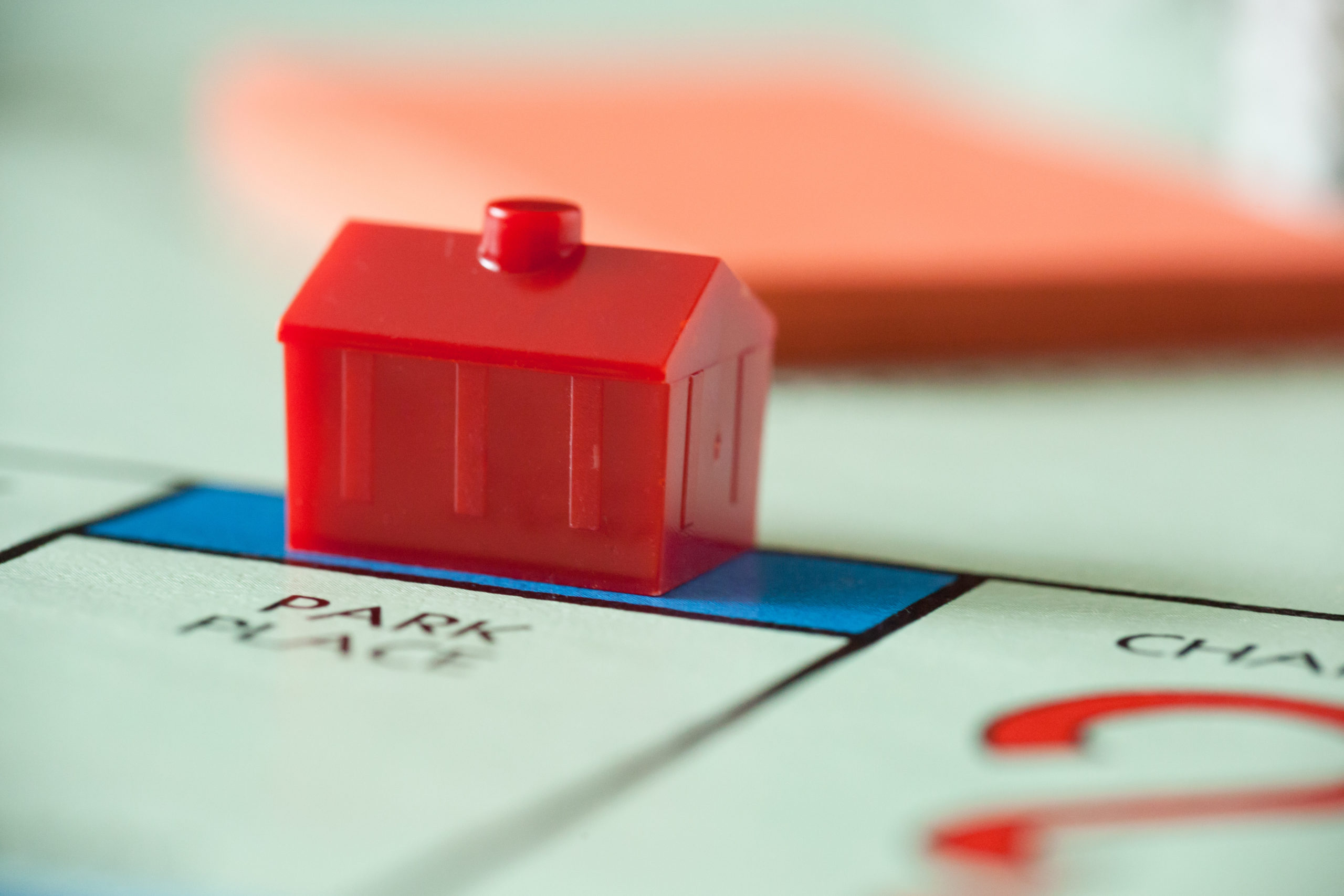 WOODBRIDGE, NEW JERSEY - October 11, 2018: A closeup view of a hotel property on a Monopoly board game, circa 1980s.