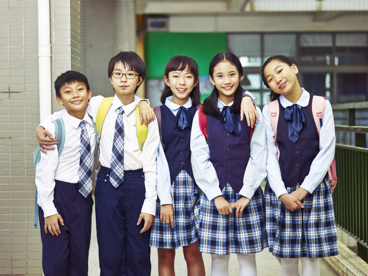 portrait of a group of asian elementary school children
