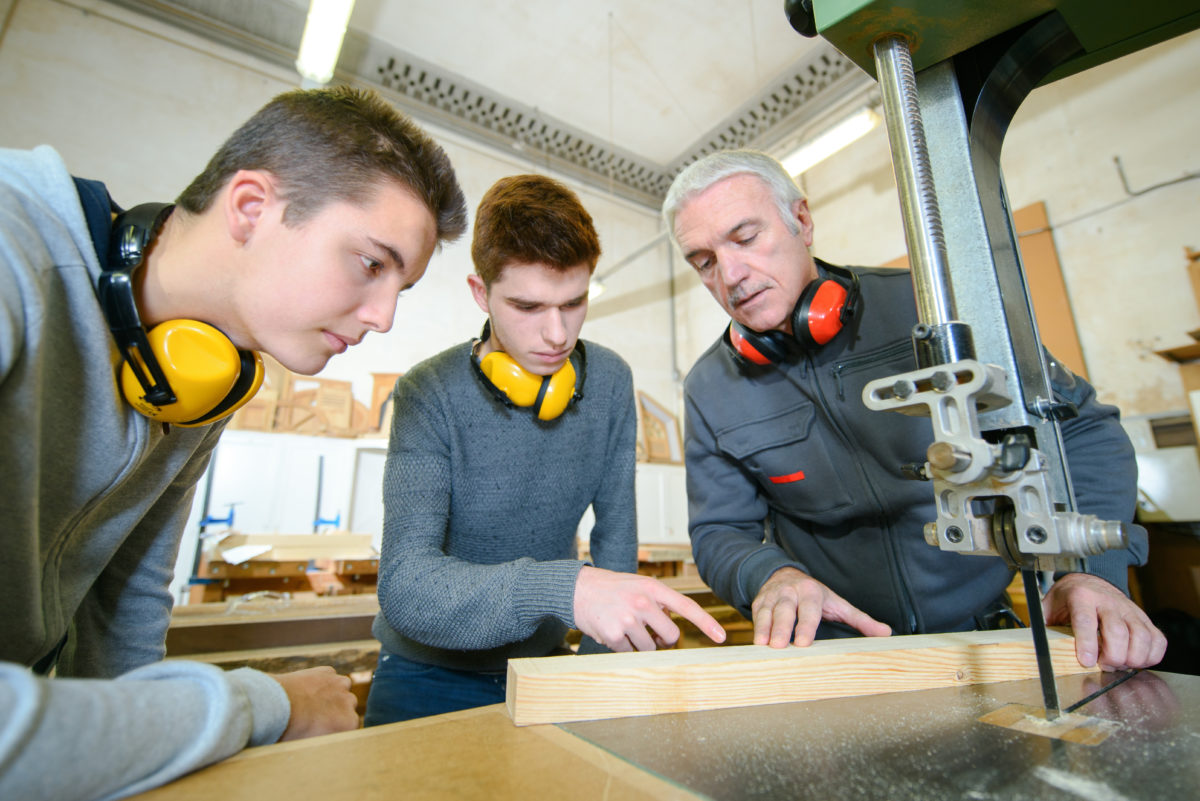 Male students in a woodwork class