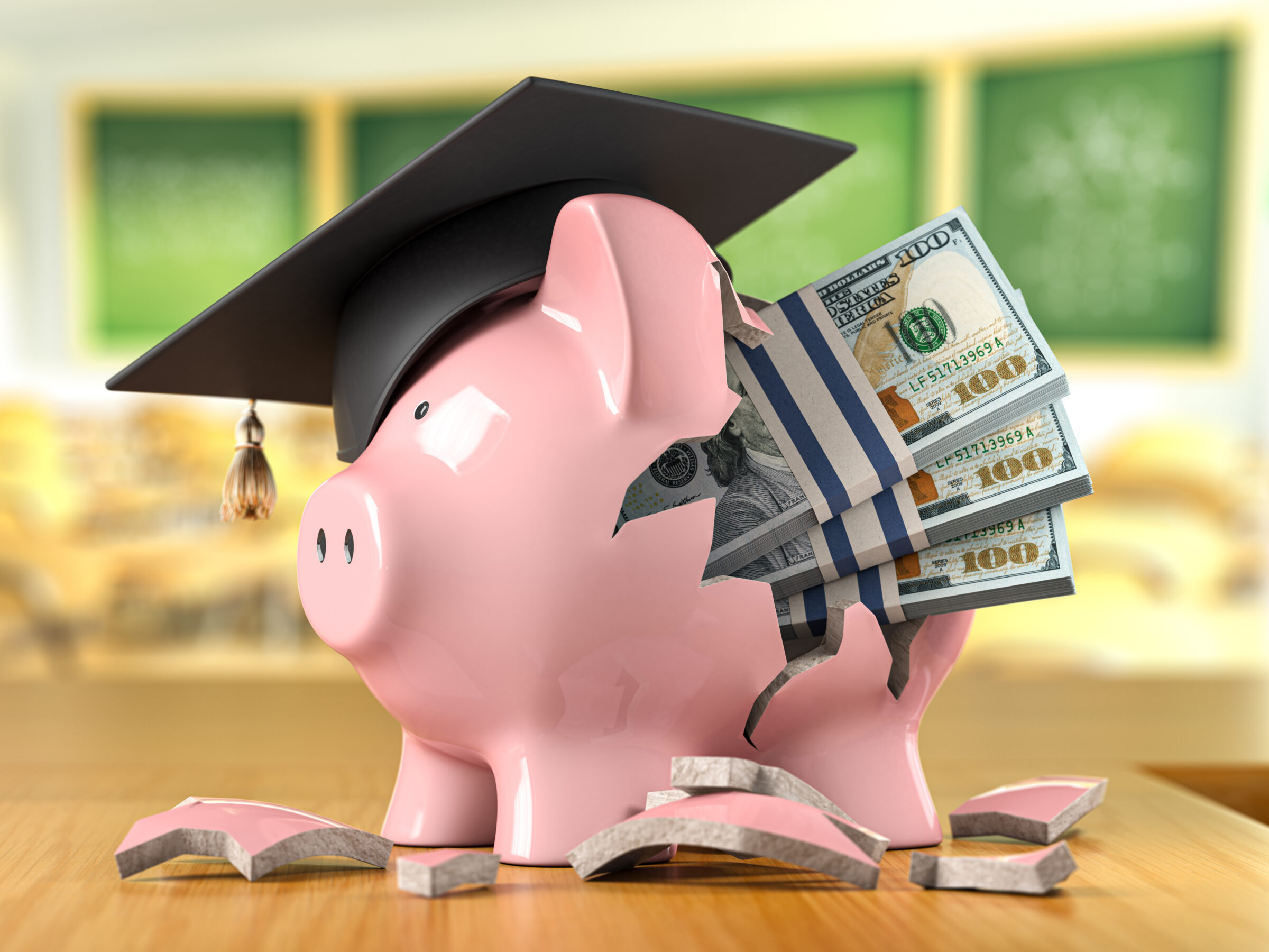 Piggy bank with money and graduation cap in a classroom. Savings or investment in education fund