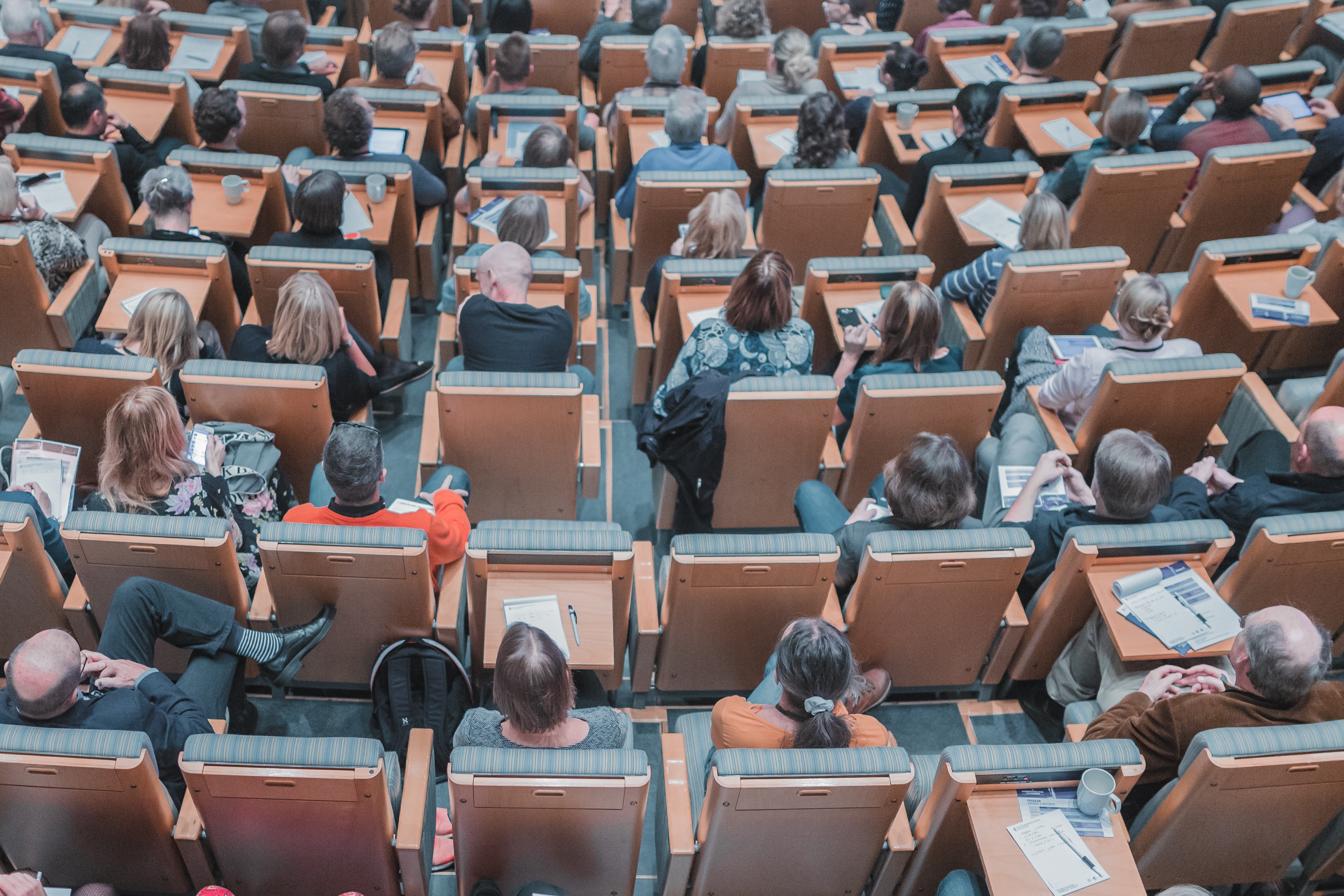 University auditorium with student from the back